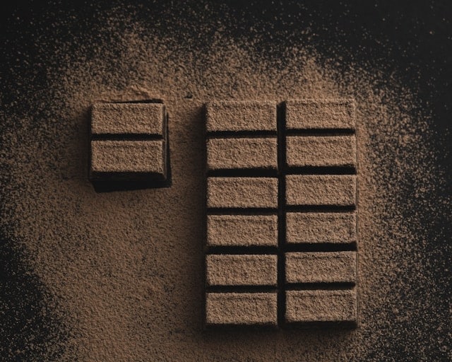 Dark chocolate pieces representing common sugar cravings