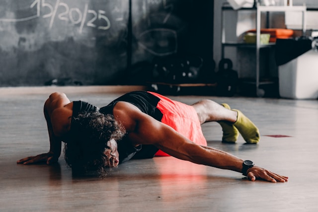 Person performing a side plank with perfect form, representing functional oblique training for core stability.