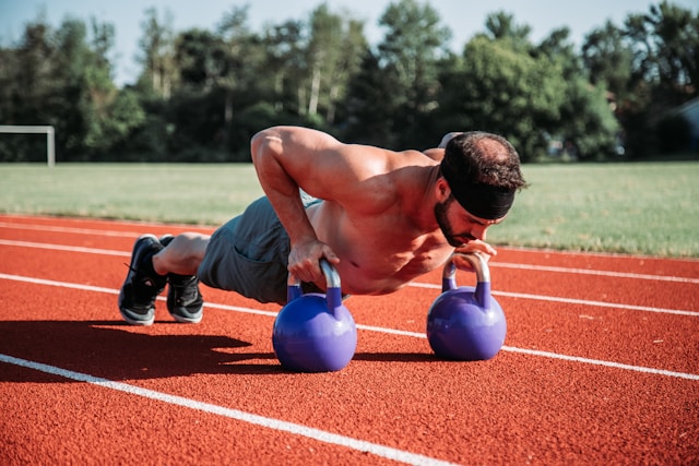 Push-up demonstration showing top and bottom positions for upper body strength training