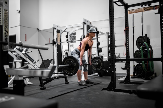 Complete Phase 1 Upper Body workout table showing exercises, sets, reps, rest periods, and coaching notes for metabolic stress hypertrophy training