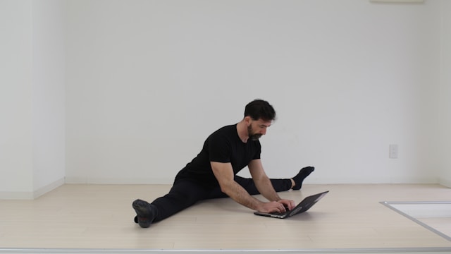 Office worker performing exercise snacks during short breaks from sitting