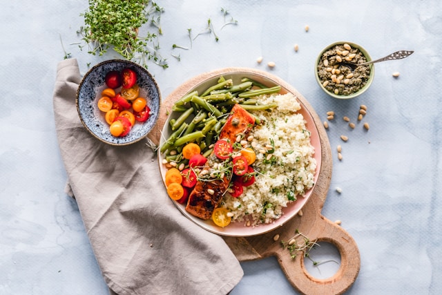 Salmon and quinoa bowl with vegetables representing the gut-brain connection between food and mood