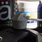 Sports supplements and powder scoop for performance training